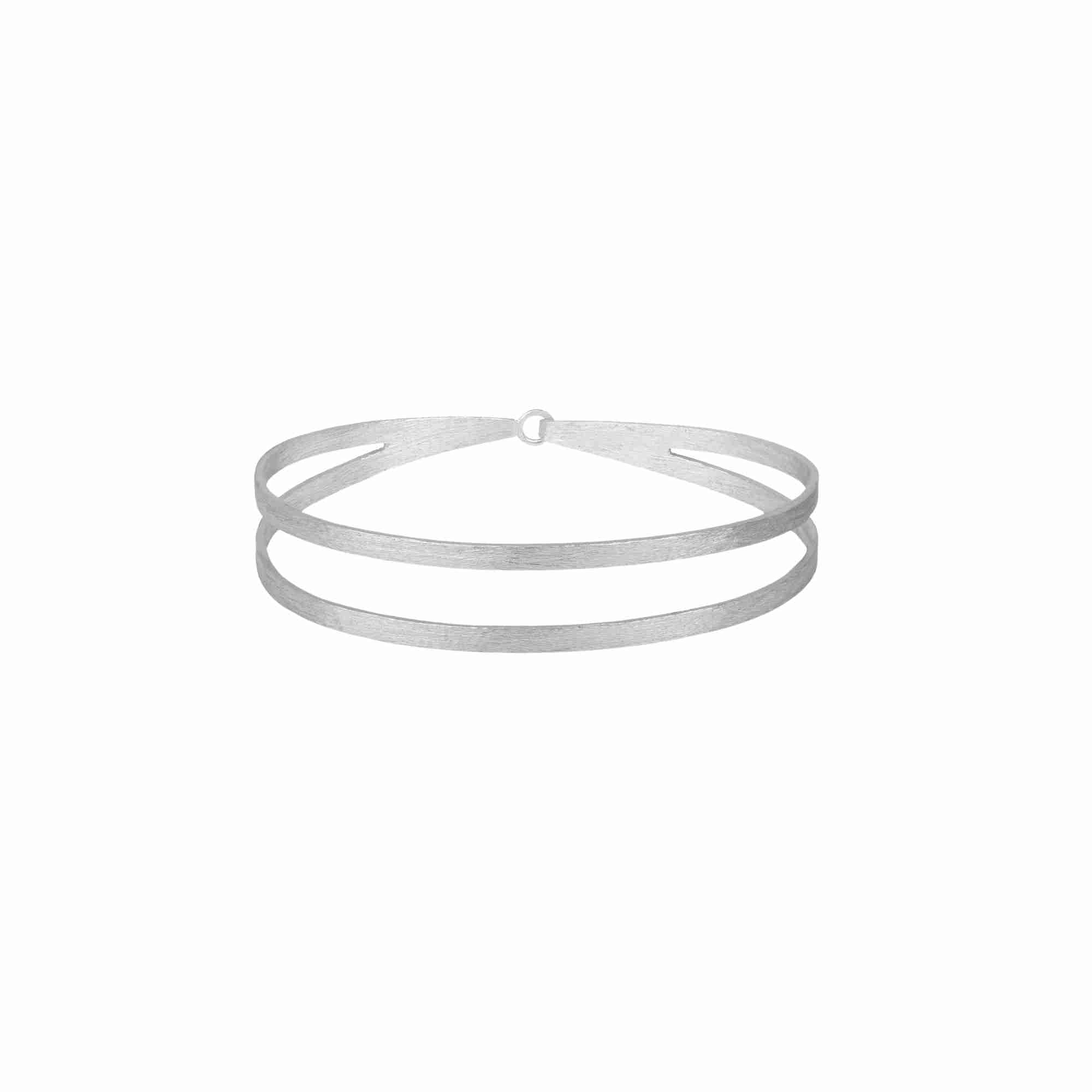 Shimmering Disks Silver Cuff; architectural sculptural flat-band double cuff design with a signature brushed-satin finish over 92.5 recycled silver.