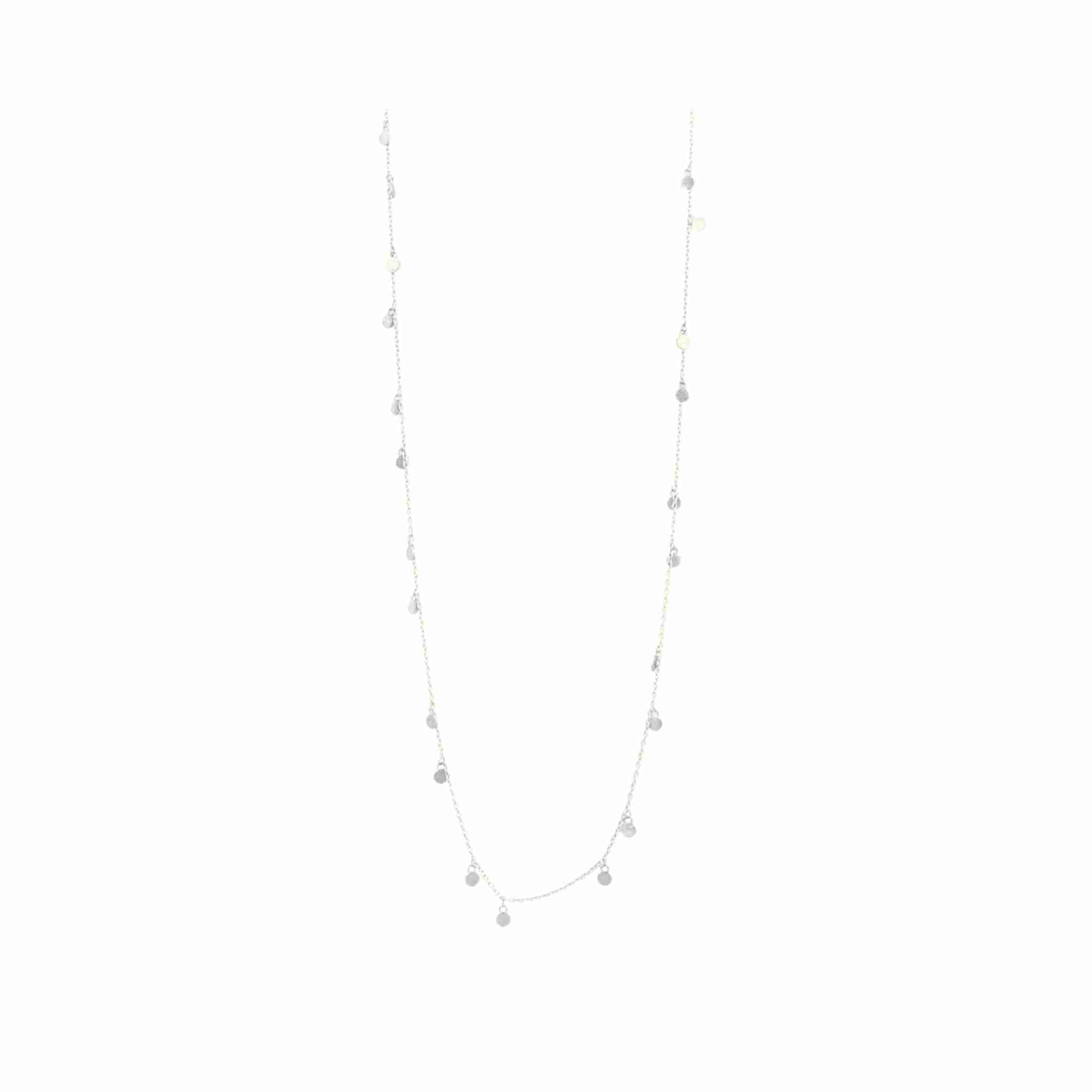 Cropped studio product view on a white background, highlighting the bottom drop of the silver Shimmering Disks Textured Long Layering Necklace with small circular disc charms scattered along a fine chain.