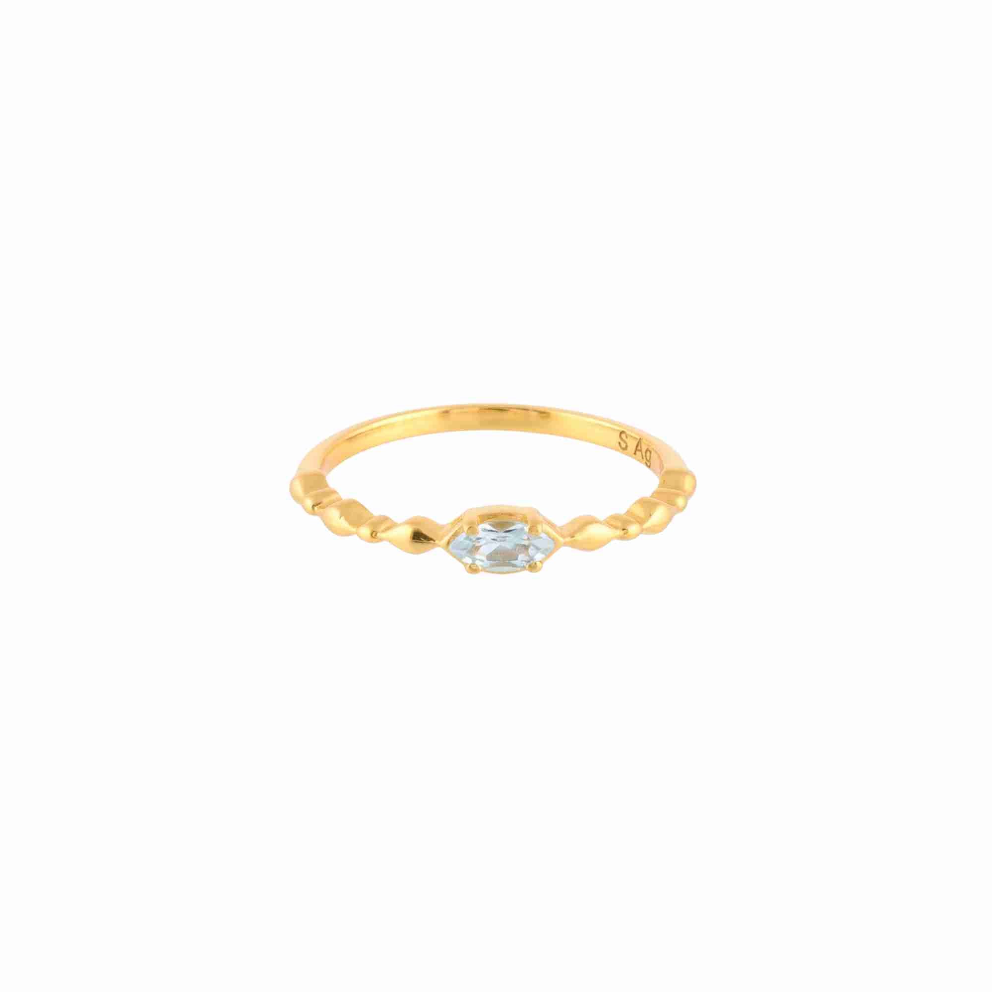 Product picture displaying a front studio view of the Delicate Vintage Dainty Marquise Blue Topaz Ring Gold against a plain white background, referencing file name RN-040-AU-BT.jpg. The piece showcases a horizontally set, faceted marquise-cut natural light blue Topaz gemstone resting centrally on a slim, tapered bubble-beaded 22K gold vermeil band by Protsaah Zurich.