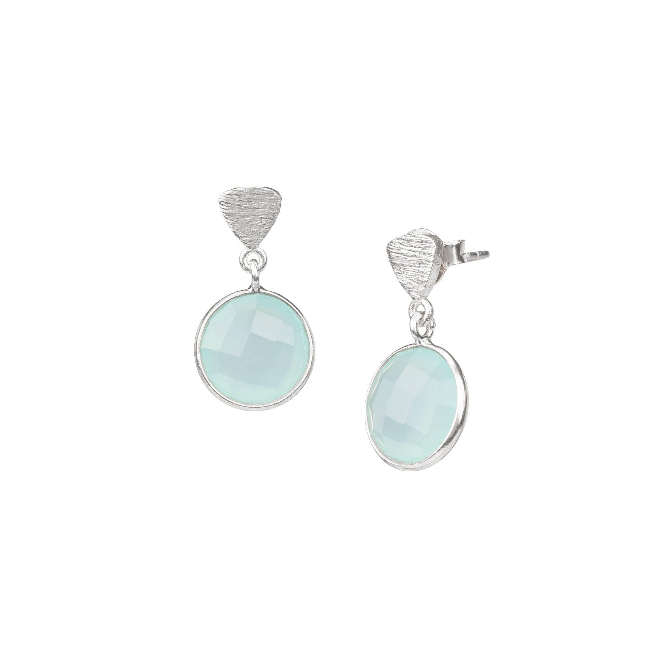Studio product photography of the Protsaah Geo Glam Triangle Aqua Chalcedony Drop Earrings in Silver, showing the round translucent sea-foam blue gemstone dropping from a textured, matte silver triangle stud.
